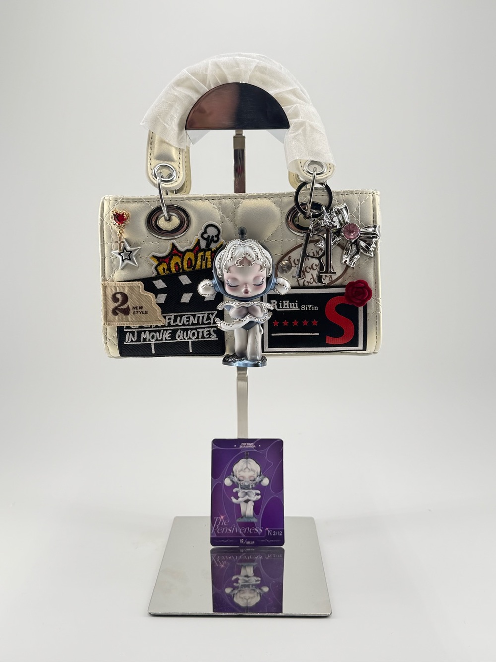 Skull panda the sound Cream Embellished Mini Handbag with Charm Details